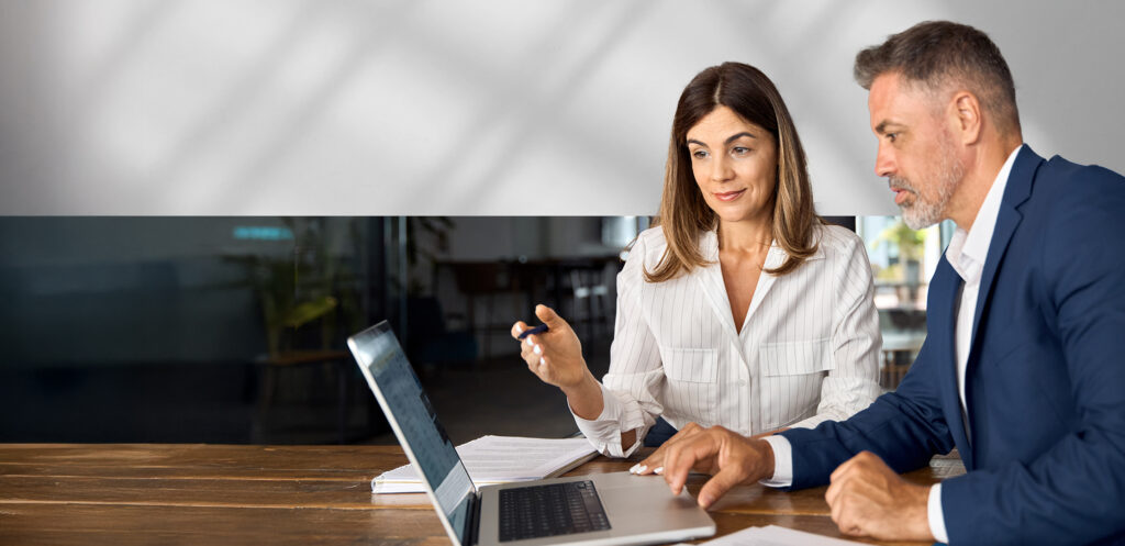 broker and employer having an open enrollment meeting